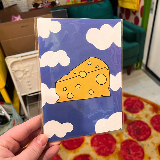 Illustration of a yellow Swiss cheese wedge floating in a blue sky with white clouds, 5x7 art print.