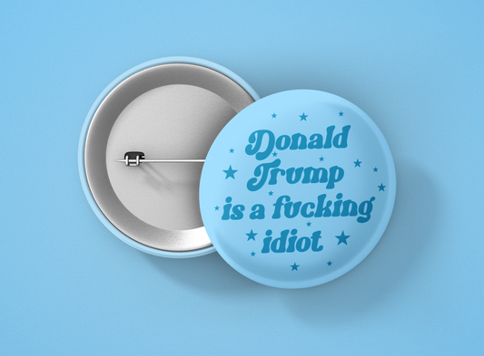 Donald trump is a fucking idiot 1.5" button
